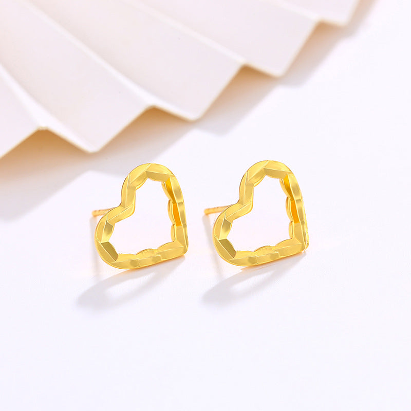 Golden heart-shaped earrings