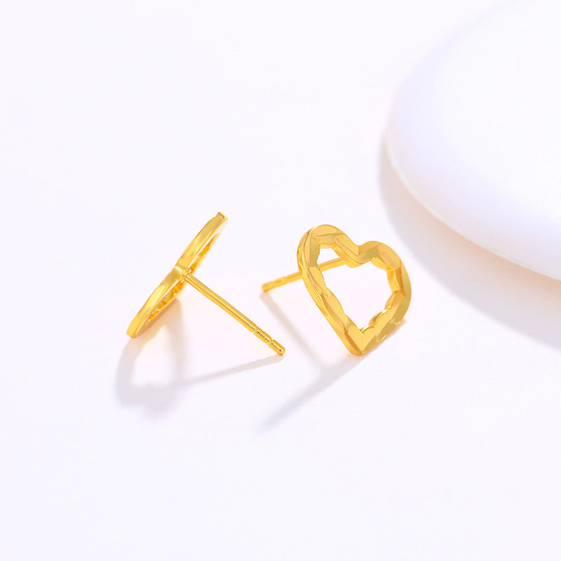 Golden heart-shaped earrings