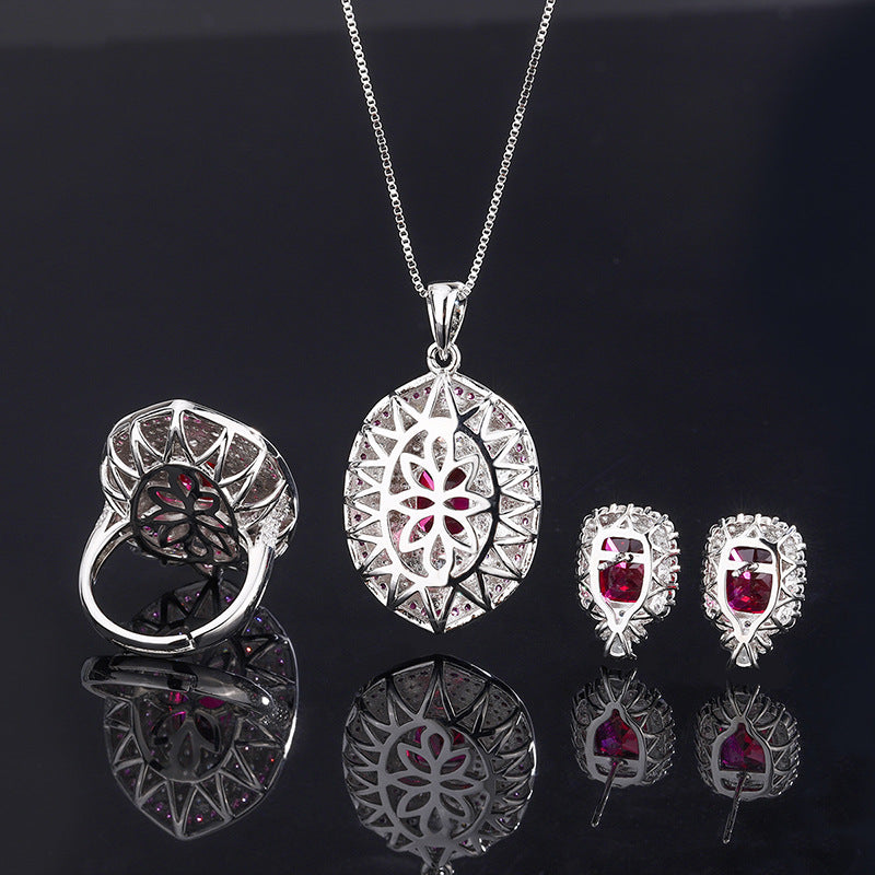 Simulated ruby dual tone stone inlaid diamond pendant ring earring set